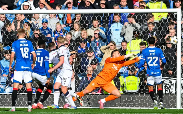 Jack Butland watches the ball onto the post