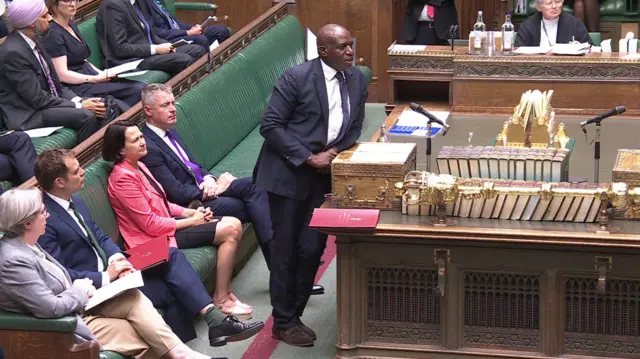 A side on shot of Lammy standing at the dispatch box in the Commons