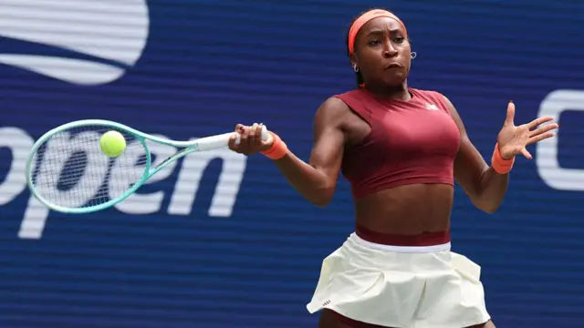 Coco Gauff returns with a forehand vs Naomi Osaka.
