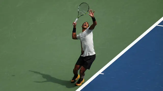 Felix Auger-Aliassime serves vs Andrey Rublev