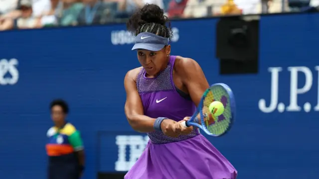Naomi Osaka returns with a forehand vs Gauff