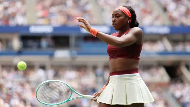 Coco Gauff receives the ball