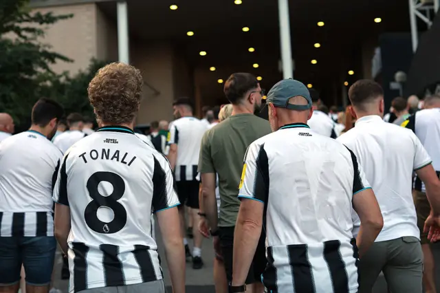 A Newcastle United fan with the name and number of Alexander Isak removed