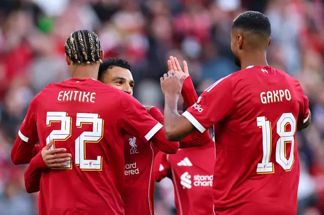 Salah, Gakpo and Ekitike celebrate a goal in pre-season