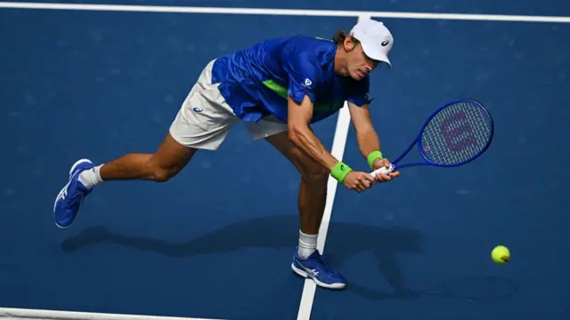 Alex De Minaur returns at the US Open