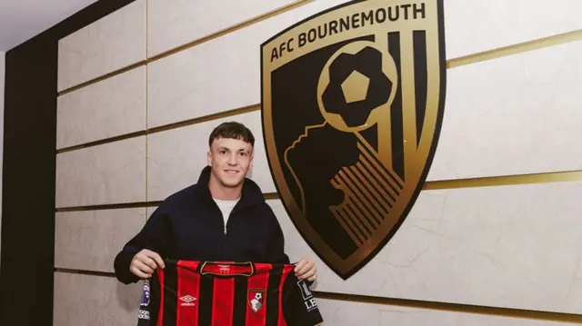 Alex Jimenez with the Bournemouth shirt