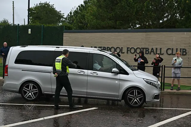 A car leaving Liverpool's training ground