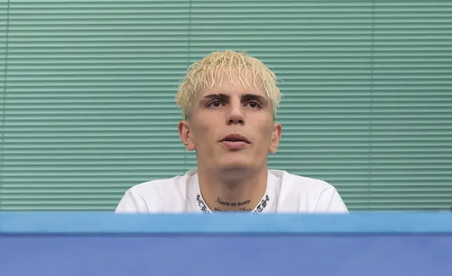 Garnacho sits in the stands at Stamford Bridge