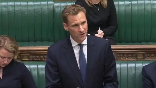 Man in suit addressing commons