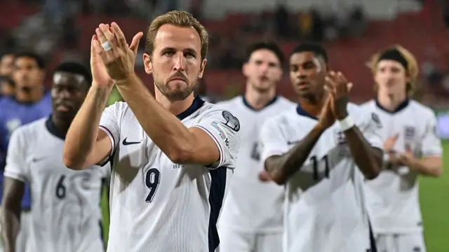 Harry Kane applauds England fans