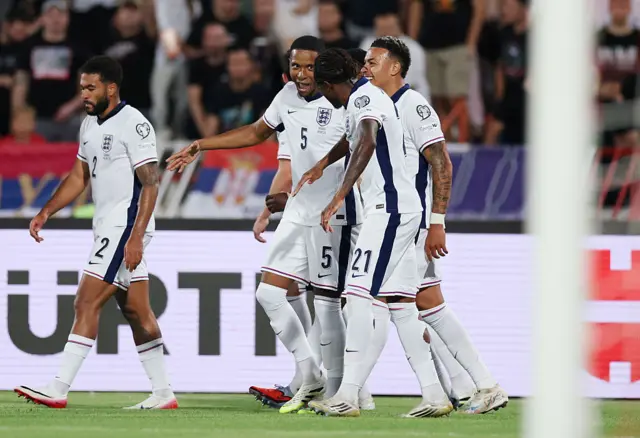 Ezri Konsa celebrates with his team-mates after scoring a goal