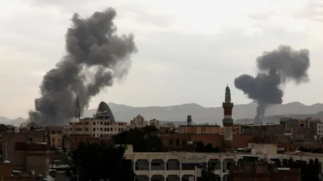 Smoke rising in Sanaa