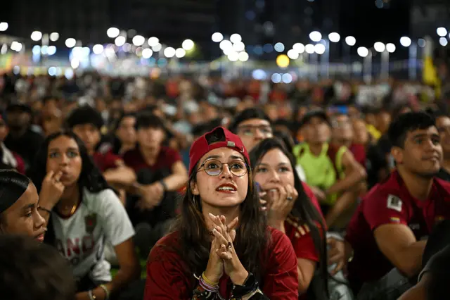 Venezuela fans watch their country play Colombia in South America qualifying