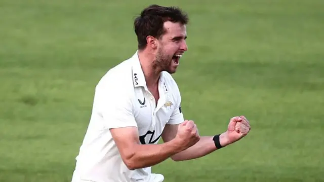 Tom Lawes celebrates a wicket