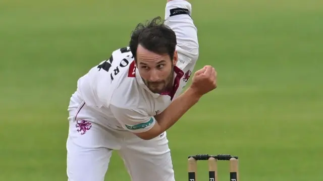 Lewis Gregory bowling for Somerset