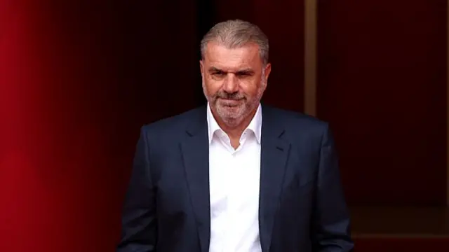 Ange Postecoglou walks out from the tunnel