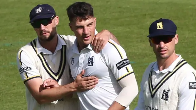 Michael Booth takes a wicket
