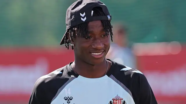 Romaine Mundle arrives during a Sunderland AFC training session