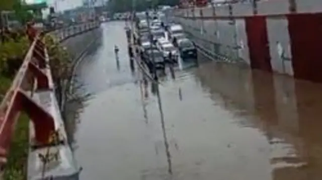 Other footage shows a flooded underpass - and some cars that avoided entering the water