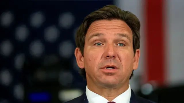 Front view of Ron DeSantis wearing a suit