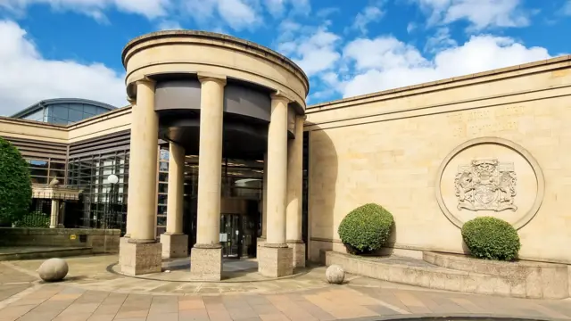 pillored entrance to court building