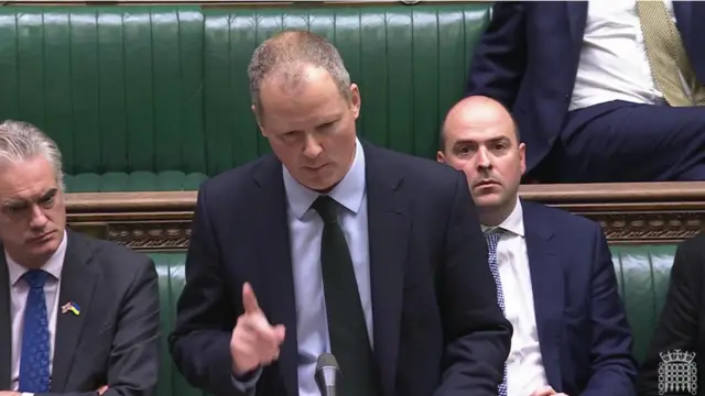 Neil O'Brien stands in the commons