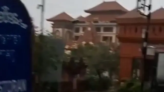 A screengrab from one video showing flooding in Bali - a sign on the left is for a noodle bar which helped place where it was shot