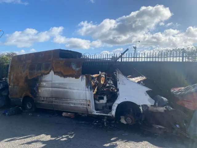 Burned out van