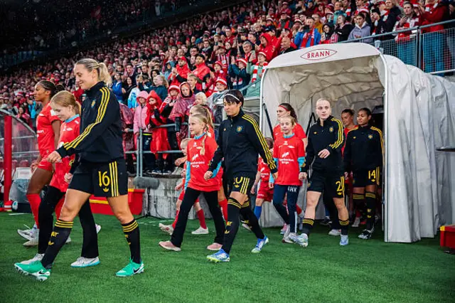 Manchester United walk out onto the pitch