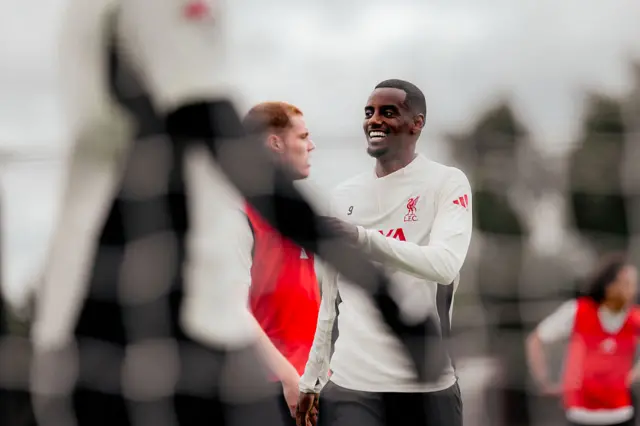 Alexander Isak smiling in training