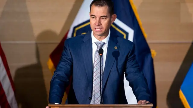 Utah Department of Public Safety commissioner Beau Mason wears a blue suit and plaid tie while speaking during a media conferenceperson who killed political activist Charlie Kirk, on September 11, 2025 in Orem, Utah. Authorities are still searching for the person who shot and killed Kirk at an event on campus on Wednesday. (Photo by Michael Ciaglo/Getty Images)