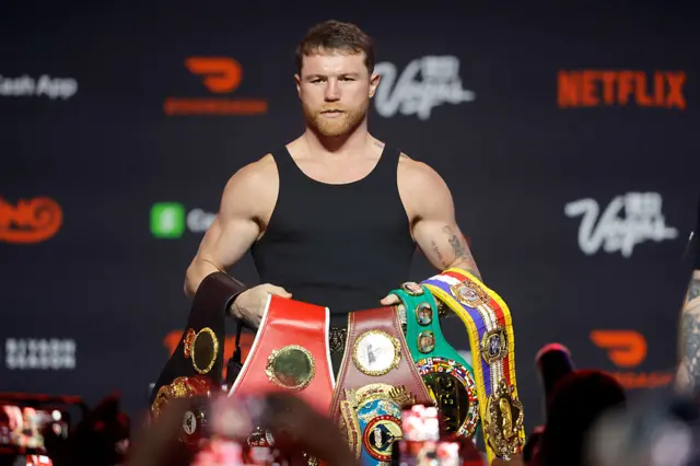 Saul Alvarez with his super-middleweight titles