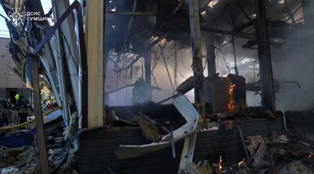 The State Emergencies Service of Ukraine posted a picture of firefighters dealing with a blaze in Sumy