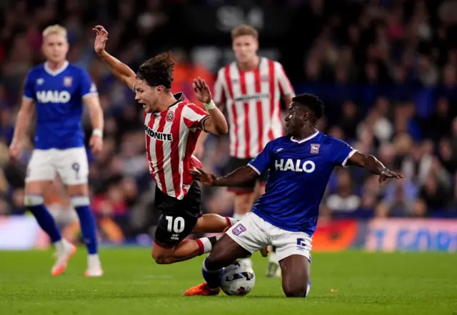 Sheffield United's Callum O'Hare is fouled by Ipswich Town's Azor Matusiwa