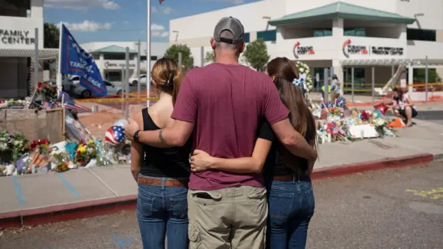 People at the memorial for Charlie Kir at Turning Point headquarters in Phoenix, Arizona.