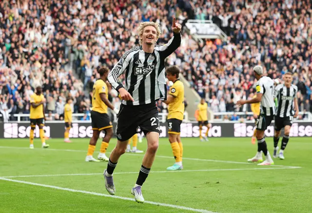 Nick Woltemade of Newcastle United celebrates scoring his team's first goal during the Premier League match between Newcastle United and Wolverhampton Wanderers at St James' Park on September 13, 2025 in Newcastle upon Tyne, England.