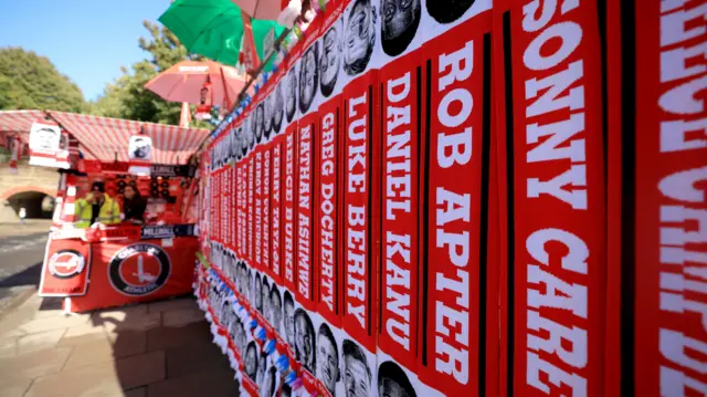 Flags for sale outside The Valley before Charlton's game against Millwall