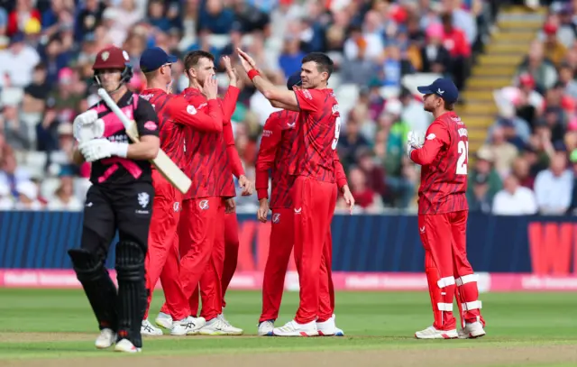 Jimmy Anderson celebrates the wicket of Tom Abell