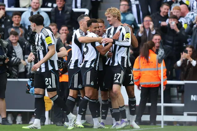Nick Woltemade of Newcastle United celebrates with teammates