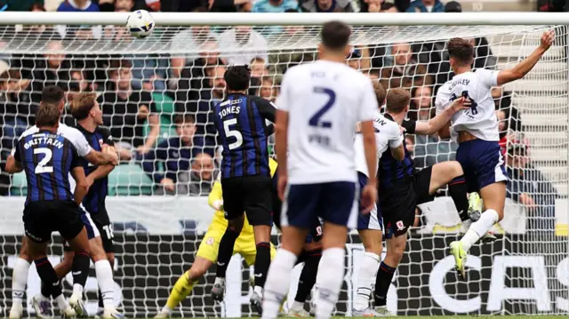 Jordan Storey heads Preston's second against Middlesbrough