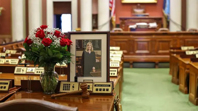 A memorial is seen on the desk of DFL State Rep. Melissa Hortman in the House chambers at the Minnesota State Capitol