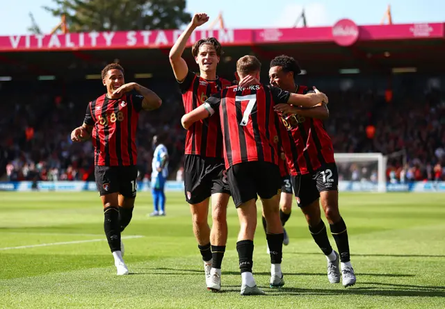 Alex Scott of AFC Bournemouth celebrates scoring his team's first goal with teammate David Brooks during the Premier League match between Bournemouth and Brighton & Hove Albion at Vitality Stadium on September 13, 2025 in Bournemouth, England.