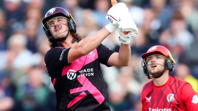 Tom Kohler-Cadmore hits a six