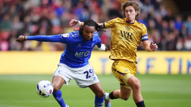 Jeremy Petris of Watford is challenged by Todd Cantwell of Blackburn Rovers