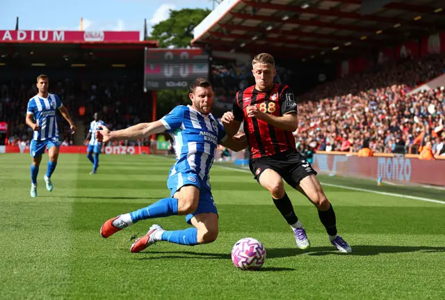 James Milner of Brighton & Hove Albion battles for possession with Adrien Truffert of AFC Bournemouth during the Premier League match between Bournemouth and Brighton & Hove Albion at Vitality Stadium on September 13, 2025 in Bournemouth, England. (