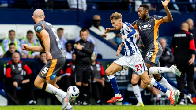 Isaac Price brings the ball forward for West Brom