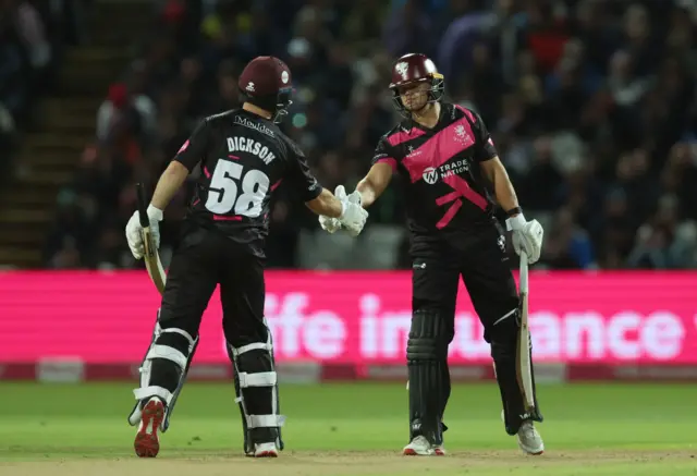 Sean Dickshire congratulates Will Smeed on reaching his 50