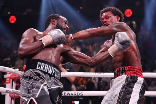Terence Crawford punches Errol Spence Jr