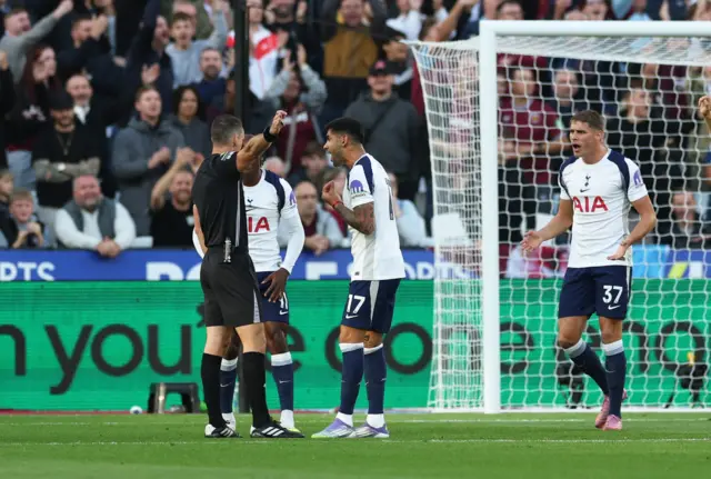 Tottenham Hotspur's Cristian Romero protests to referee Jarred Gillett after he disallowed their first goal