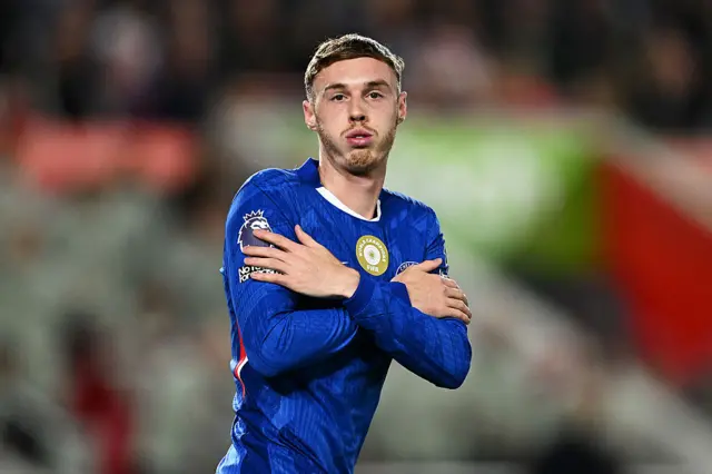 Cole Palmer of Chelsea celebrates scoring his team's first goal